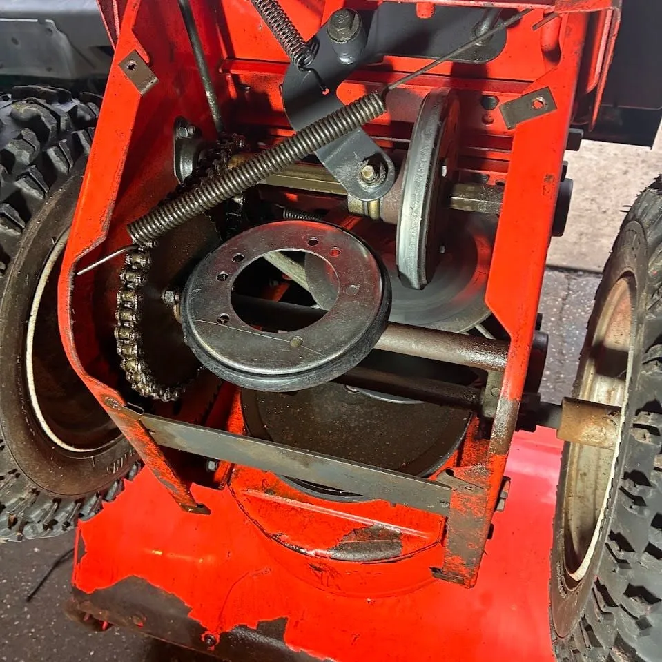 Snowblower drive and friction wheel opened up for repair